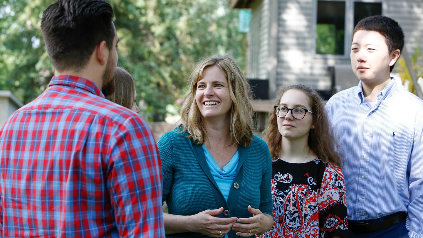 Kelly Moller talks to neighbors