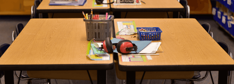 A row of desks in a Minnesota classroom