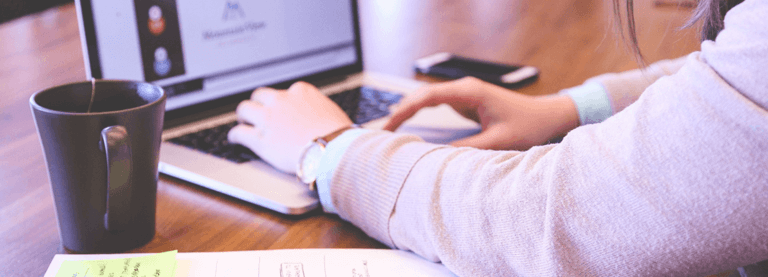 image of a person at a computer