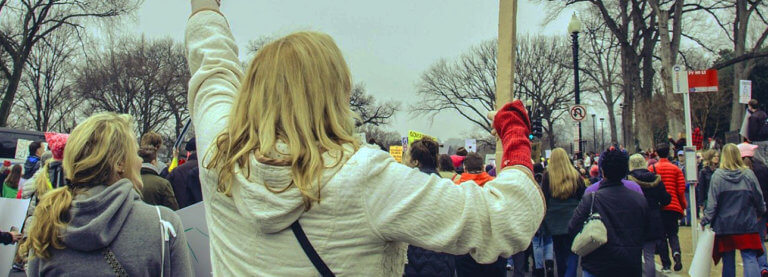 A group of people marching in a protest