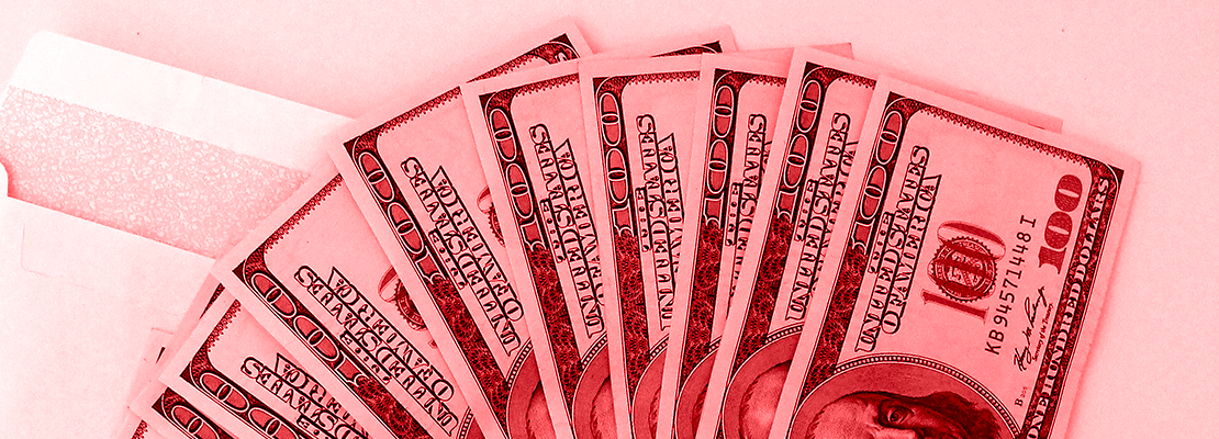 hundred dollar bills with a red overlay