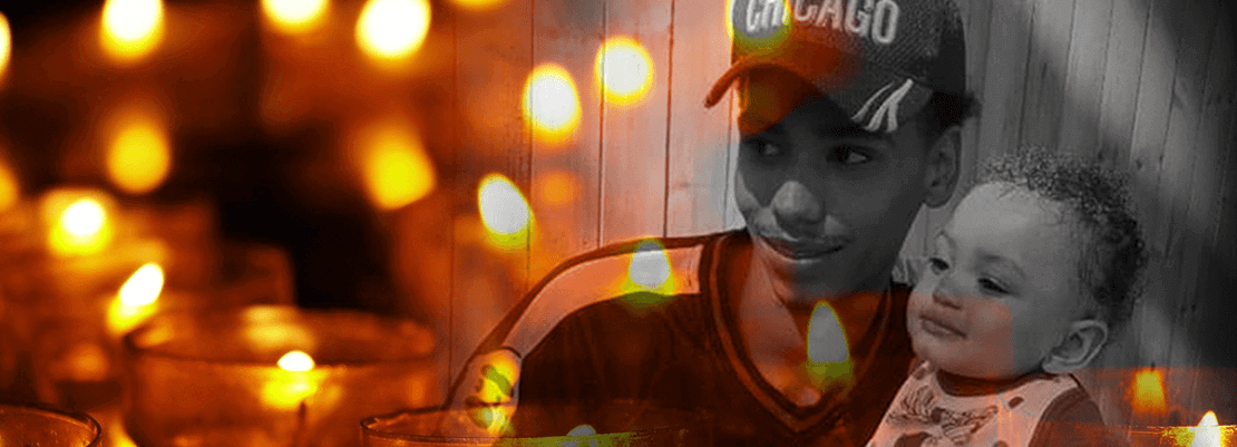 Daunte Wright and his son superimposed on an image of lit candles
